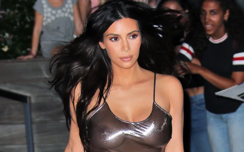 kim kardashian braless in see through metallic dress