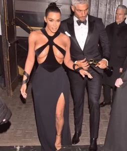 kim kardashian wearing very revealing dress that shows off her big cleavage and underboob