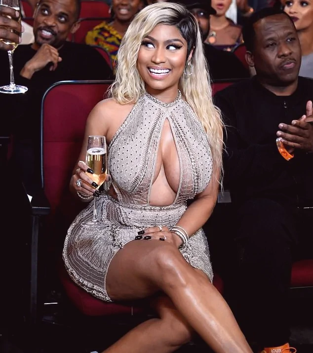 monster cleavage from nicki minaj in daring open chested dress
