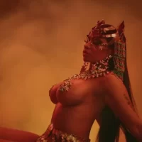 nicki minaj exposing her big tits for music video queen