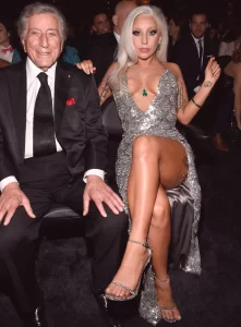 lady gaga wearing a revealing dress that shows her thigh tops
